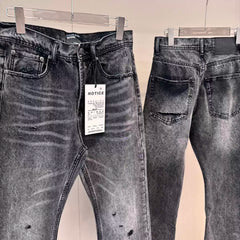 ERD washed denim jeans with distressed and patched holes