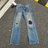 ERD stained and distressed patched jeans