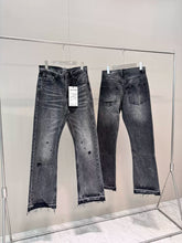 ERD washed denim jeans with distressed and patched holes