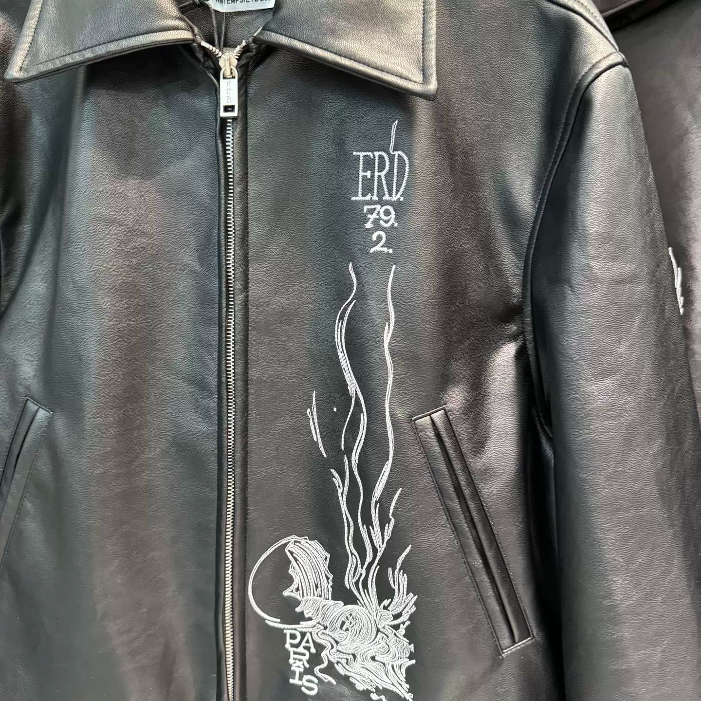 ERD mystery man embroidered PU leather jacket