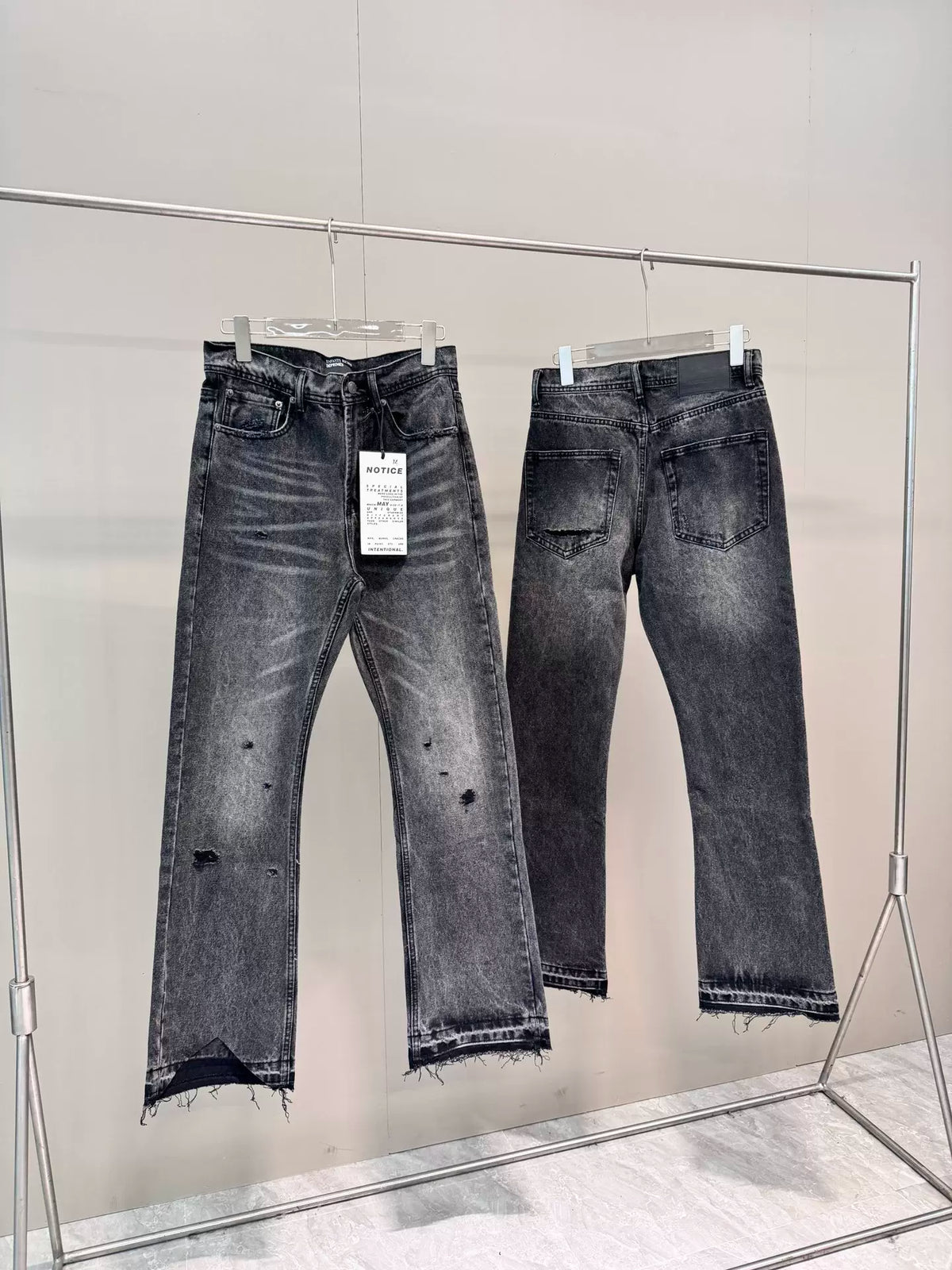 ERD washed denim jeans with distressed and patched holes
