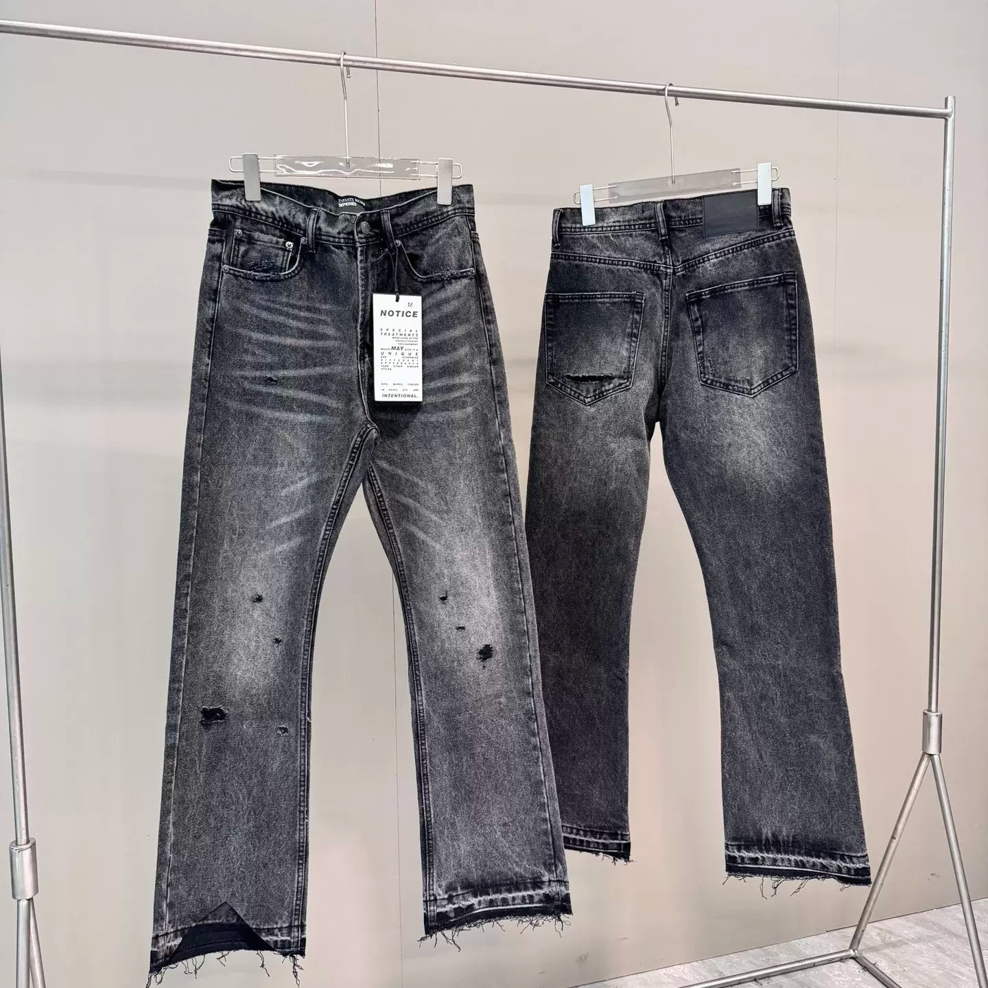 ERD washed denim jeans with distressed and patched holes