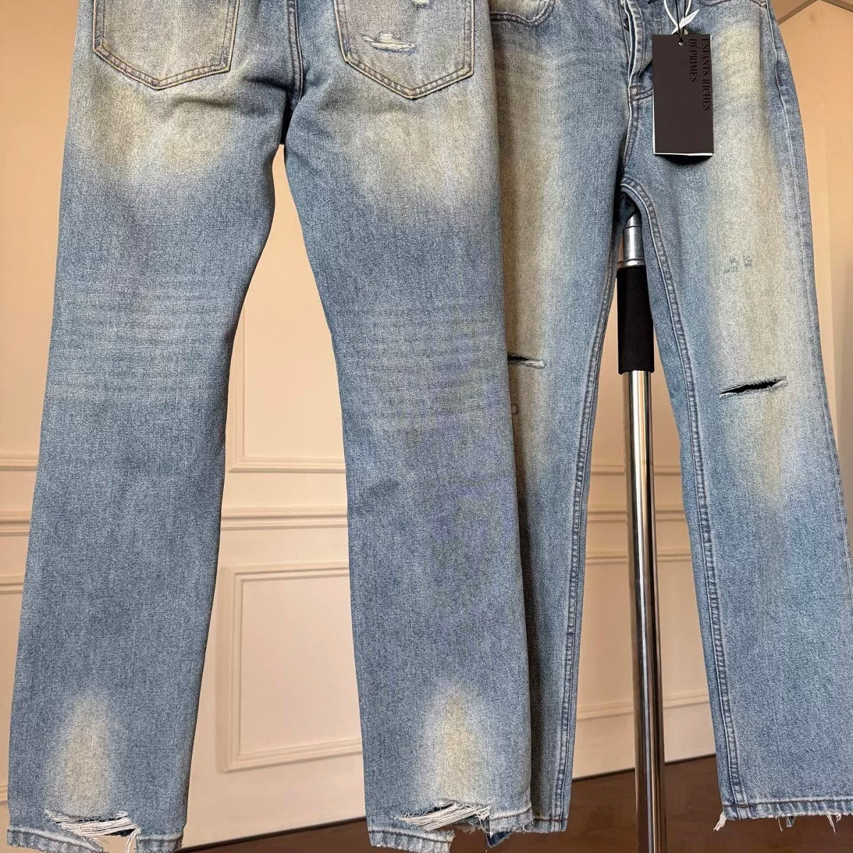 ERD mud-dyed knife cut a hole in the blue jeans